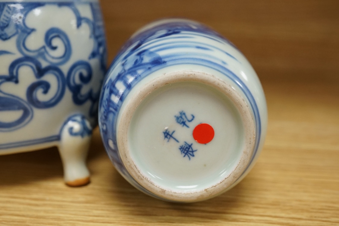 A Chinese blue and white rouleau vase and a similar tripod censer, tallest 18.5cm